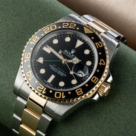 rolex steel and gold gmt